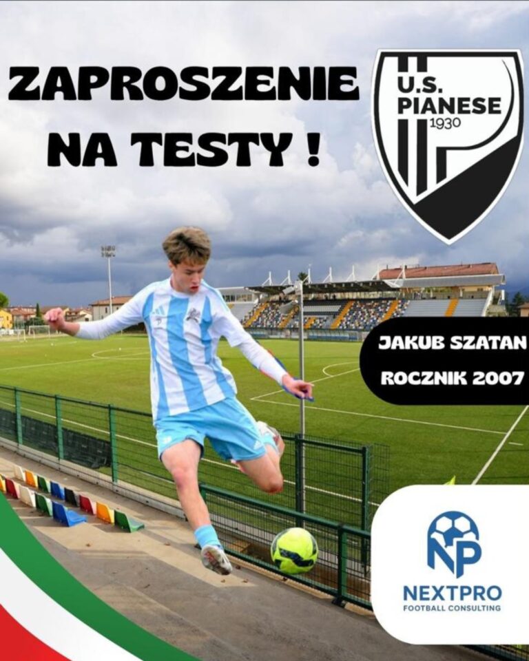 Jakub Szatan kicking a ball in front of the stadium